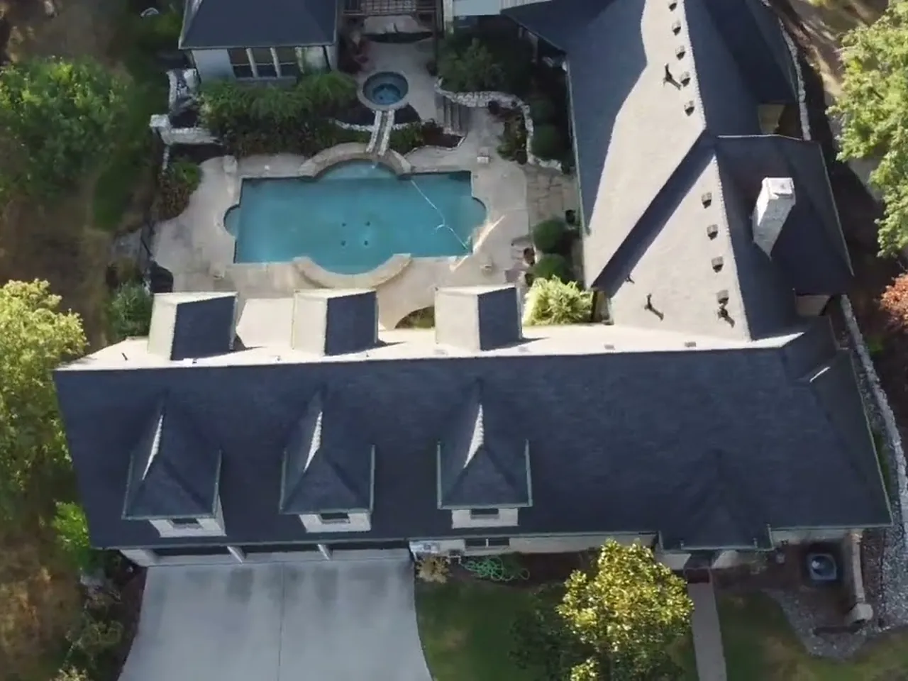 Aerial view of a completed roof on a Flower Mound, TX home